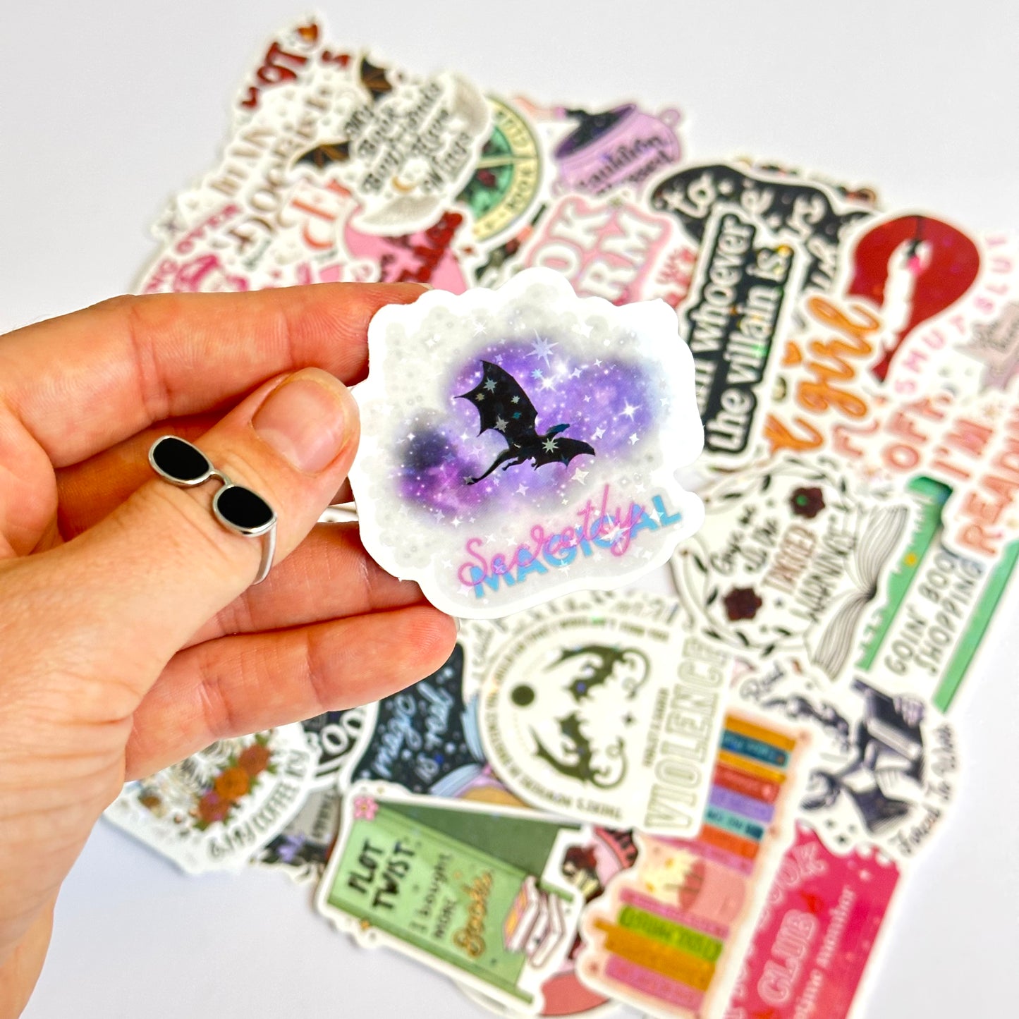 Bookish spicy and dark stickers with holographic finish, 50-piece random pack featuring romance and fantasy designs with dragons