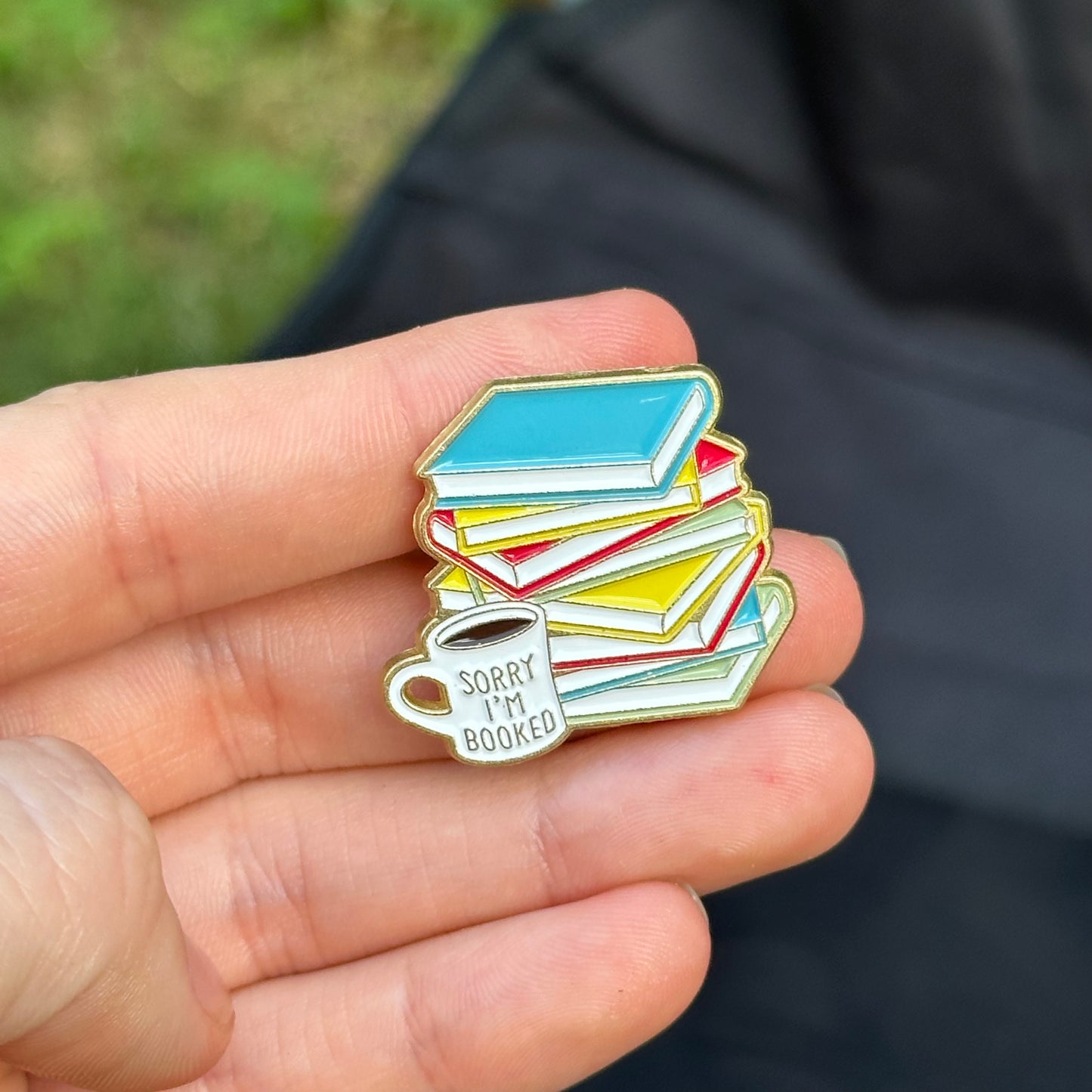 Pin “Sorry, I’m booked” (Cup & Book Stack)