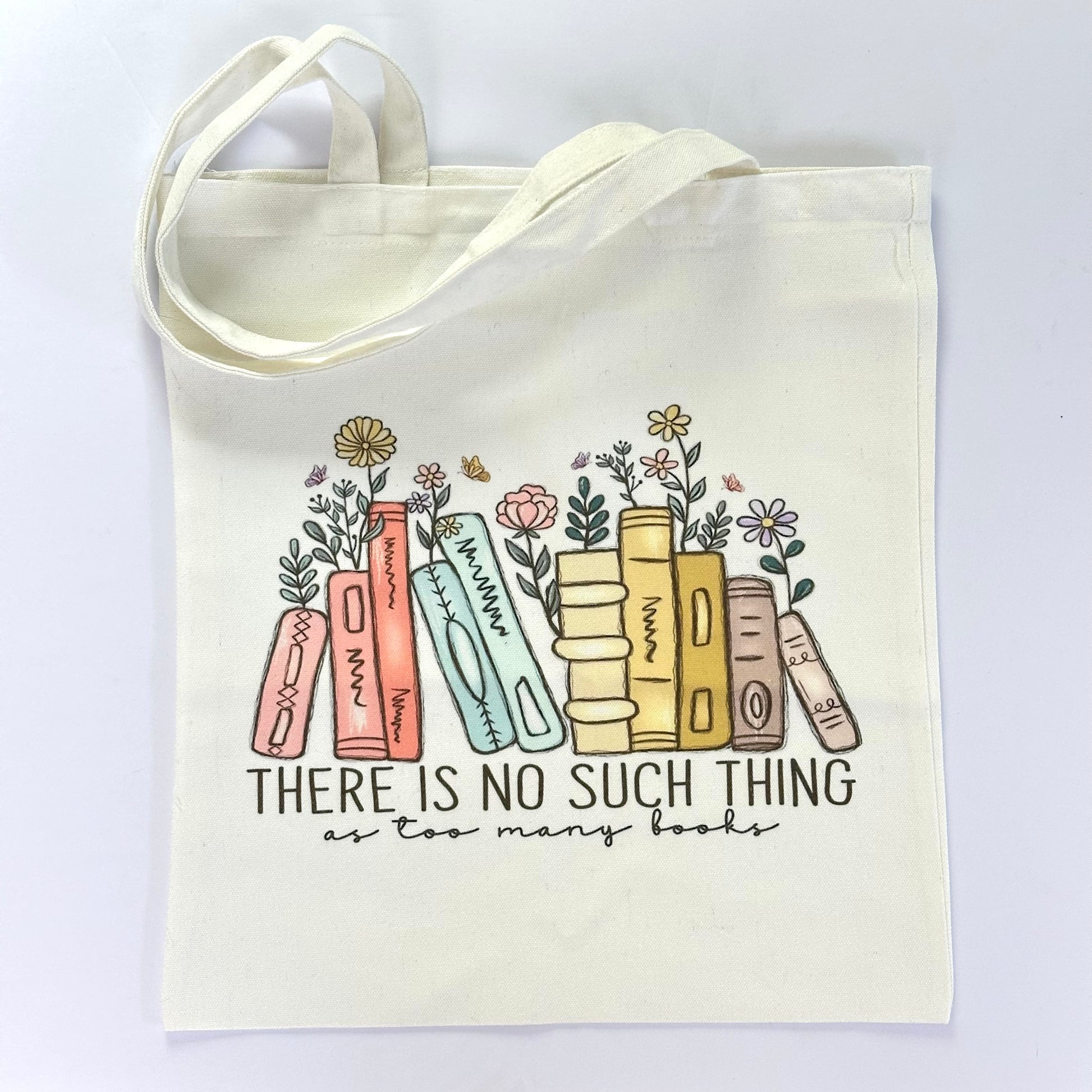 Tote bag with books and flowers design and text on a white background