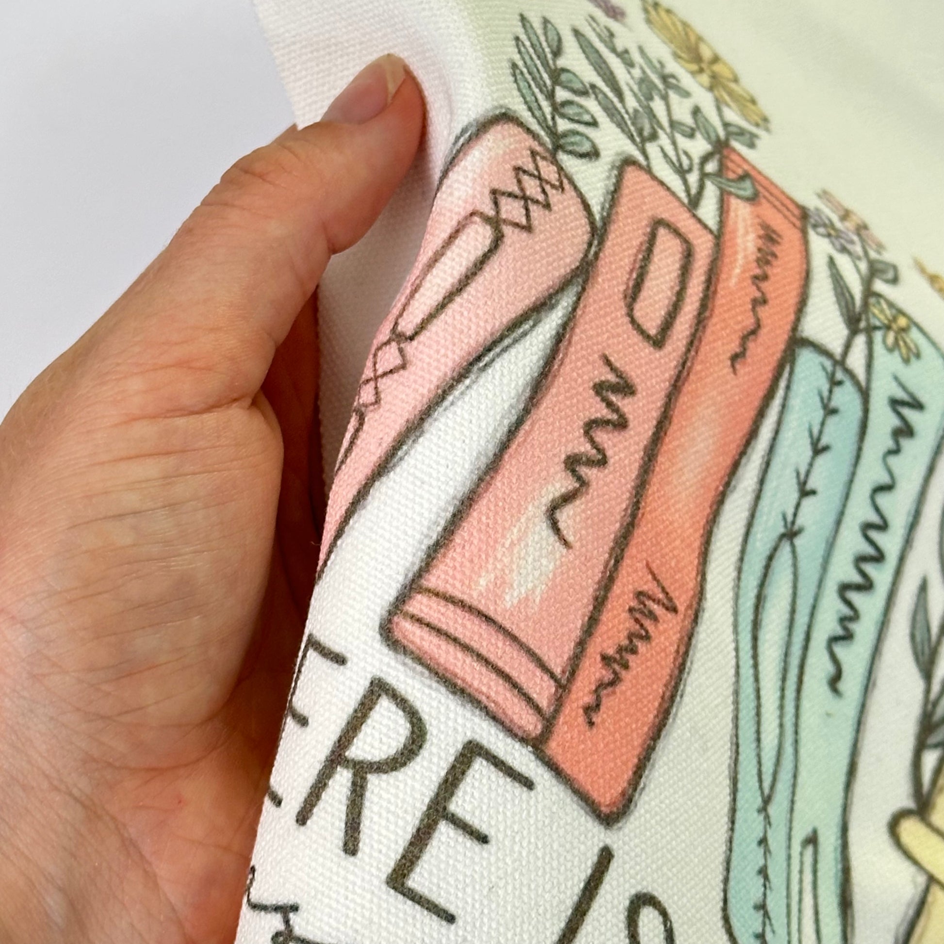 Reusable cotton tote bag with the quote “There is no such thing as too many books” — ideal for book lovers, readers, and bookworms