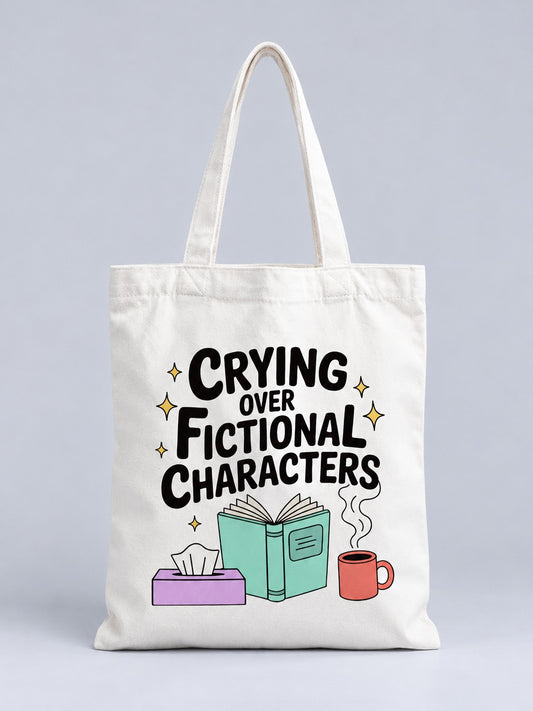 Crying Over Fictional Characters bookish tote bag, front view with tissue box, open book and coffee mug print