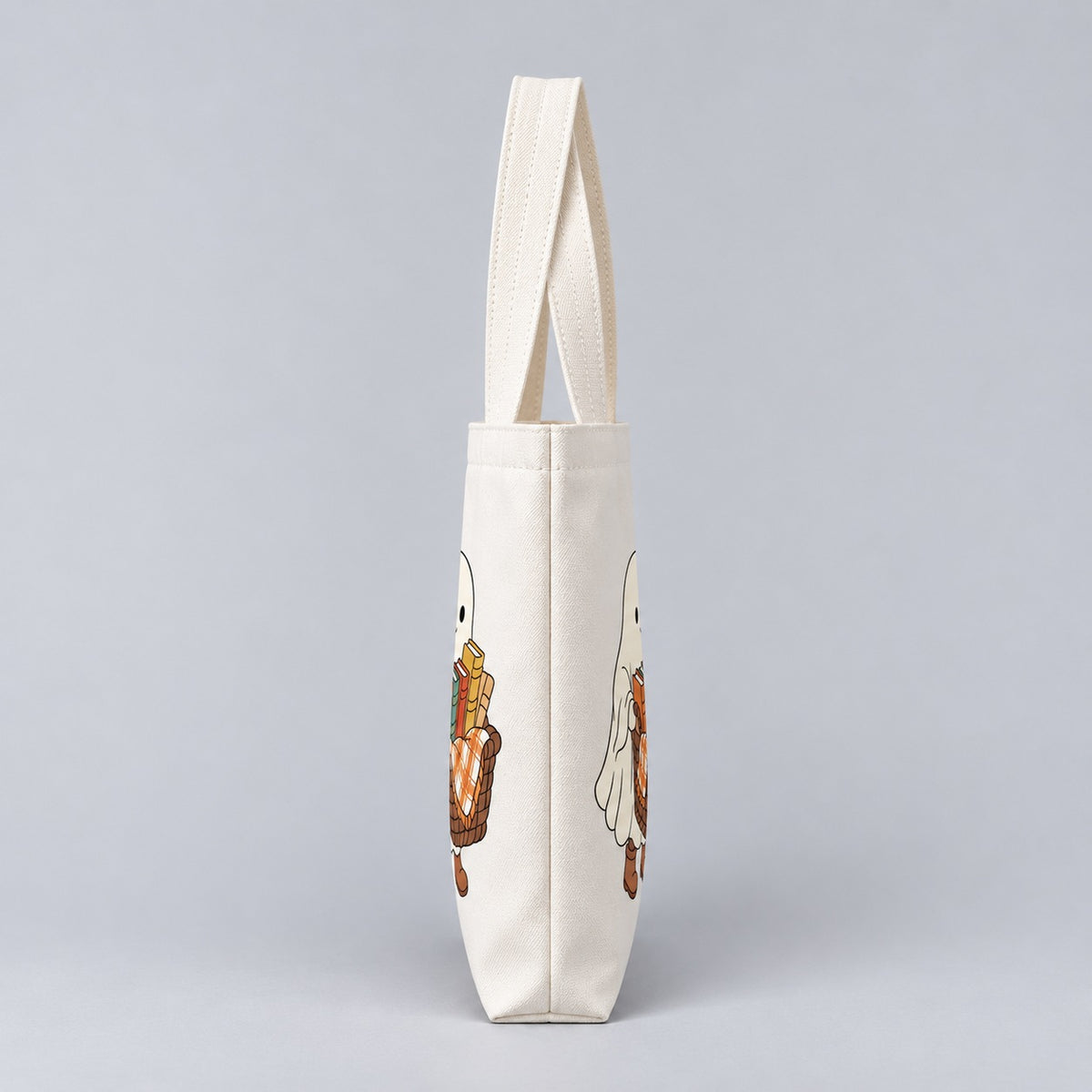 Ghost with a Basket of Books tote bag, side profile
