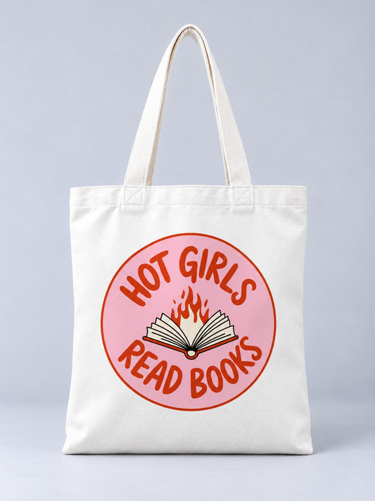 Hot Girls Read Books bookish tote bag, front view with pink badge and flaming open book print